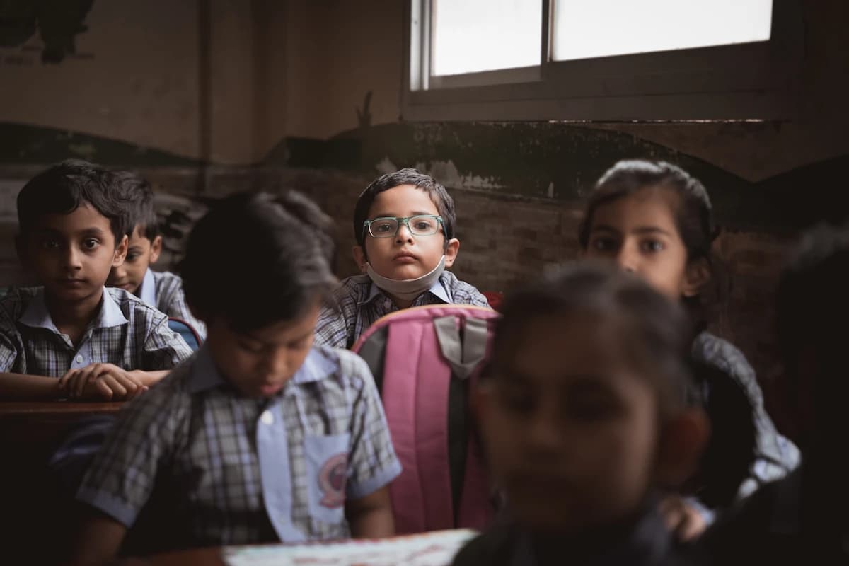 Young students at their desks in a classroom