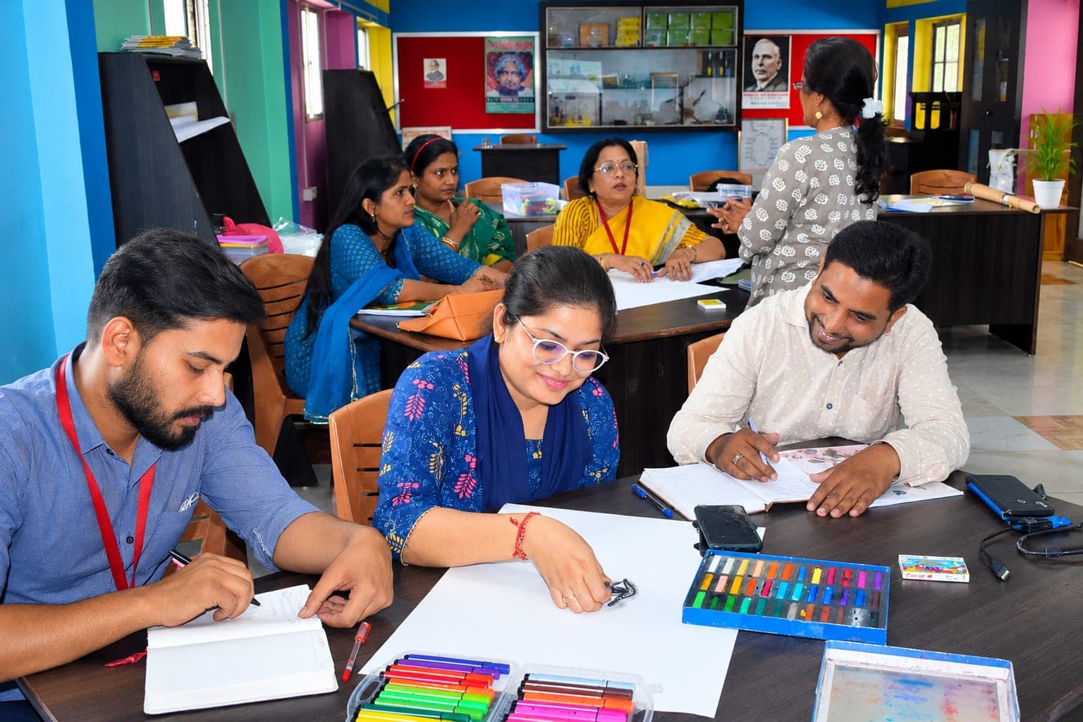 Udaya Public School teachers exploring creativity through colours and art.