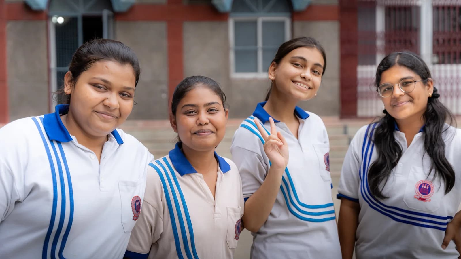 Senior students outside the main building at Udaya Public School, Ayodhya